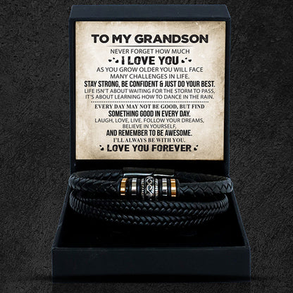 A leather-style bracelet with a black presentation box, containing a heartfelt message card, displayed on a dark background.